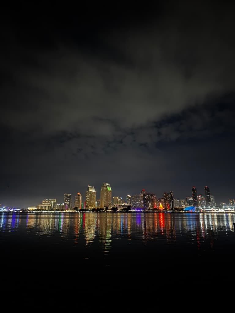 City lights reflected on water